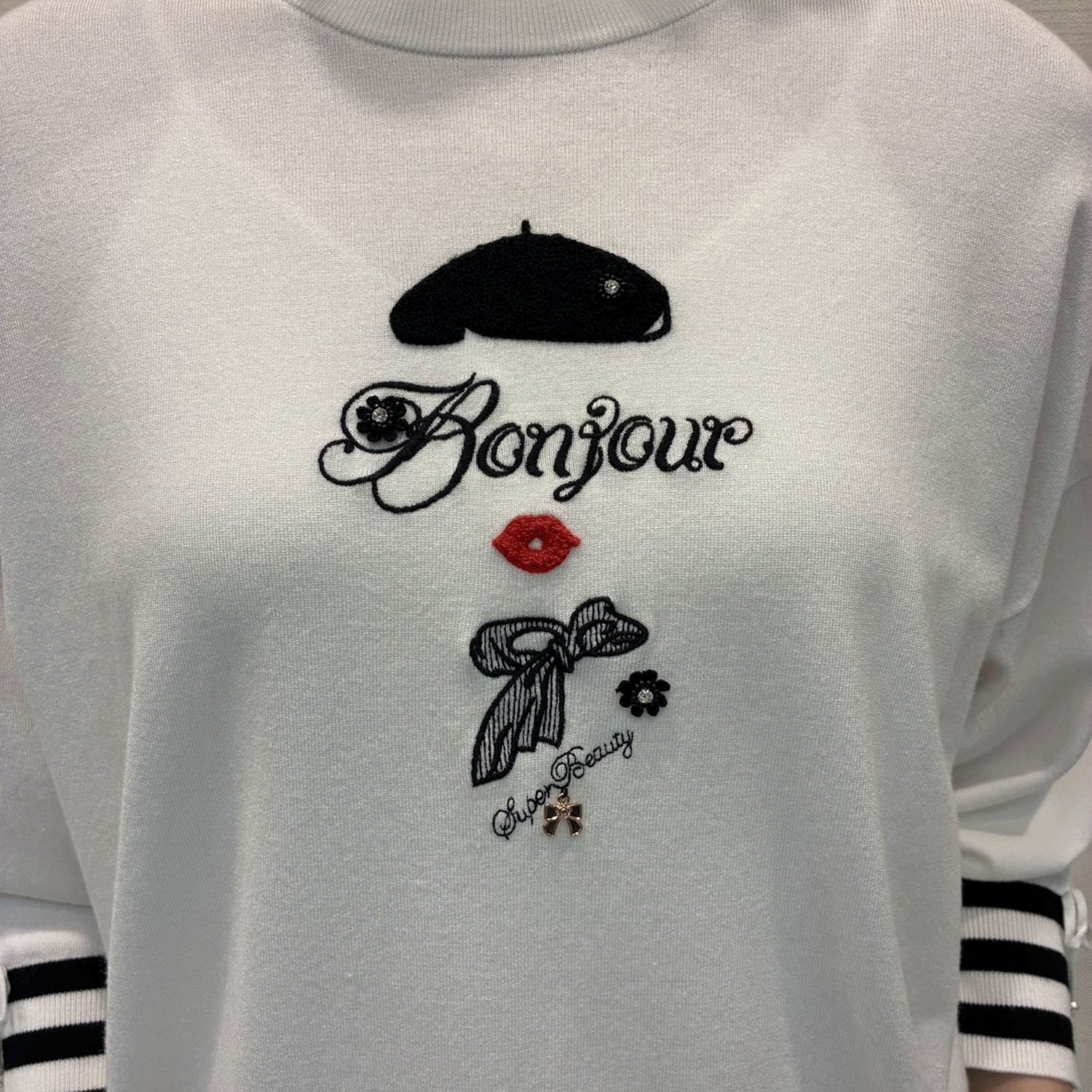 Super Beauty 胸元刺繍裾ボーダーニット - 画像5