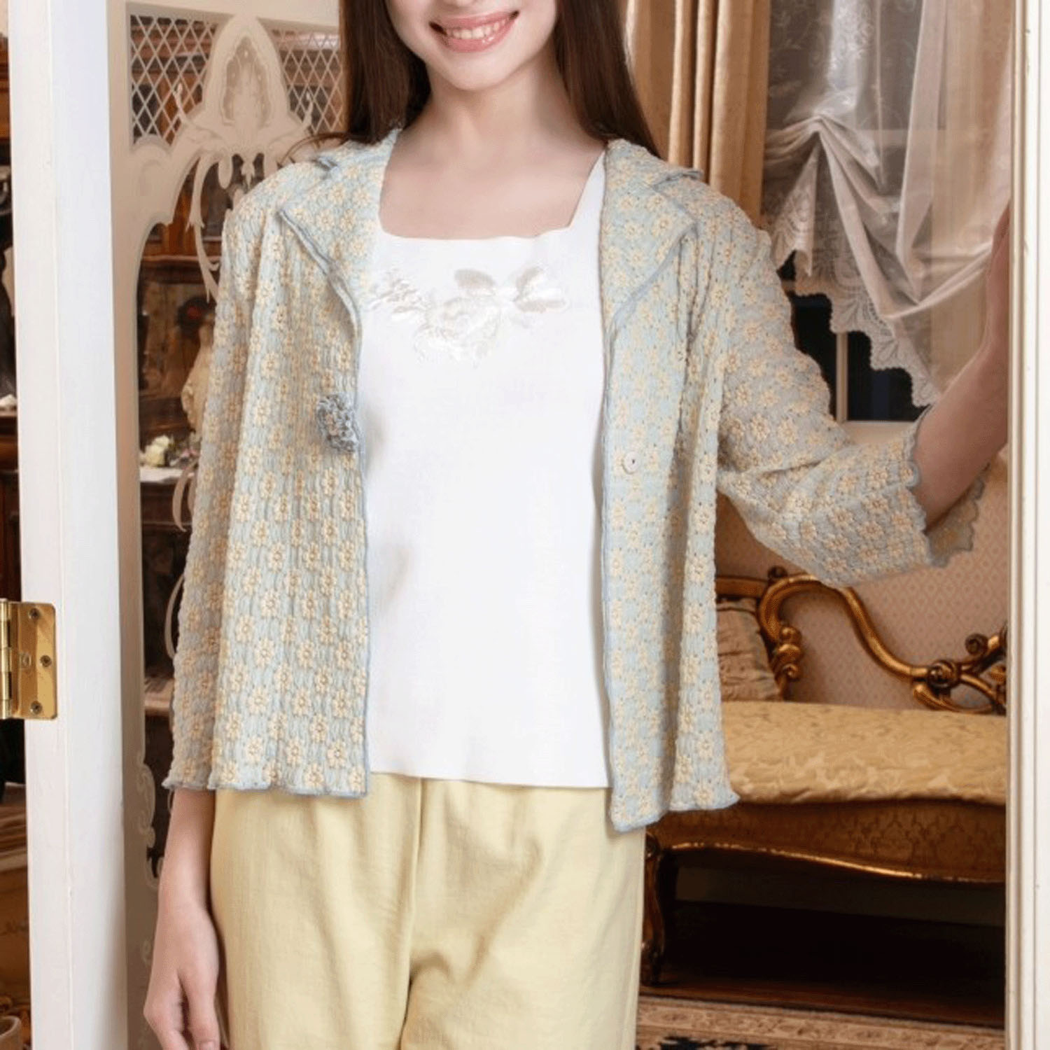 Super Beauty 胸元スパンコール刺繍ノースリーブニット - 画像1